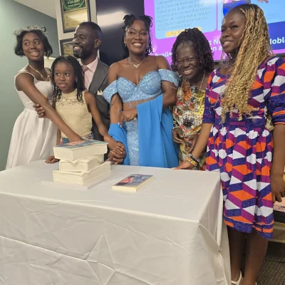 book launch cutting the cake